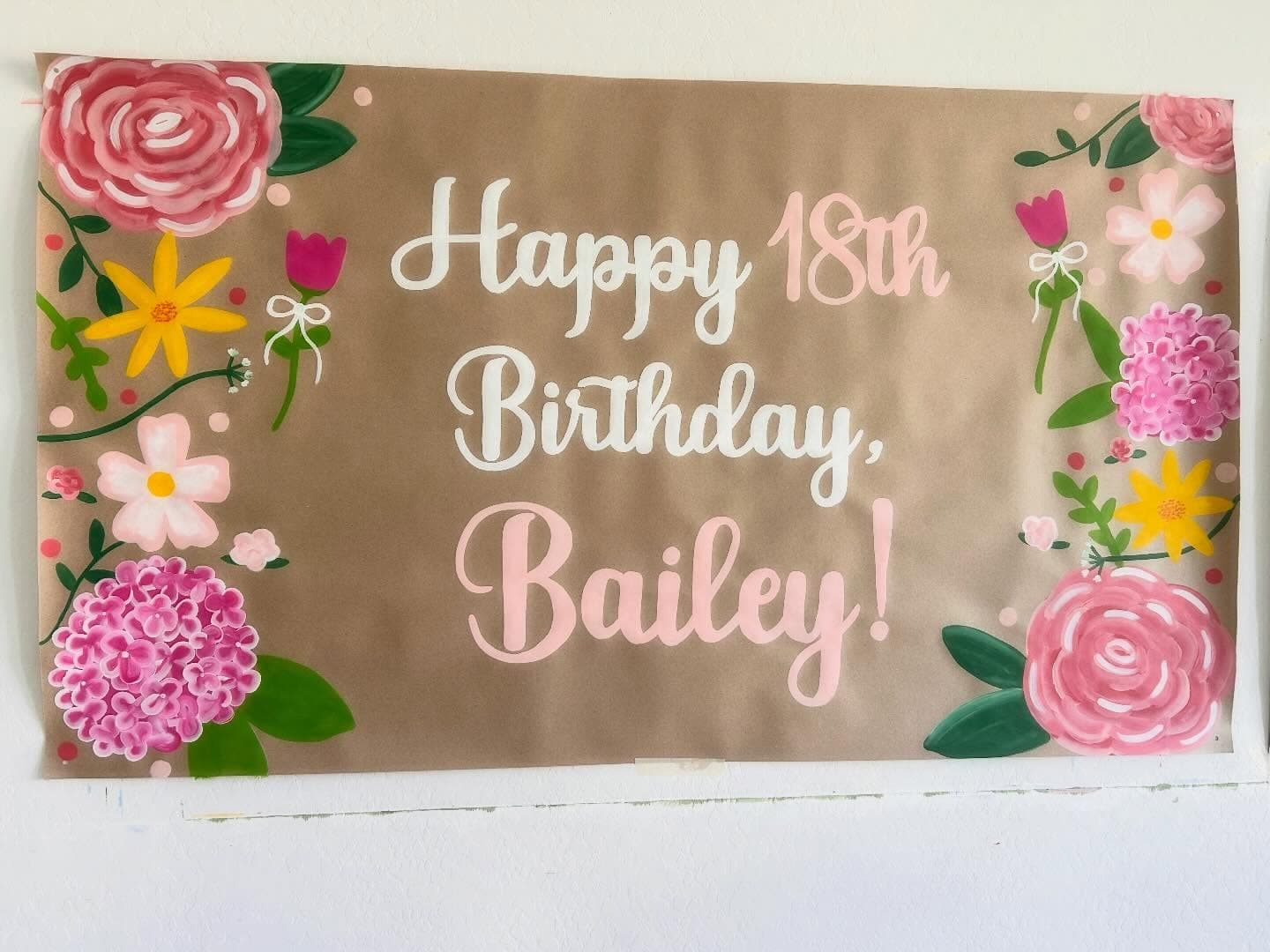 Hand-painted floral 18th birthday banner reading Happy 18th Birthday, Bailey!